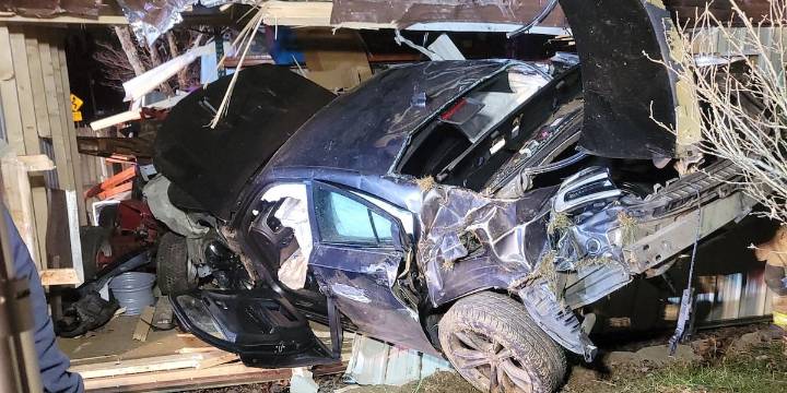 Two people trapped, injured after vehicle hits Grayson County outbuilding