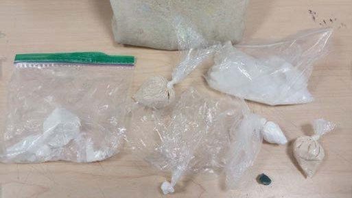 Police seize $74K in drugs, charge two in SW Calgary drug bust