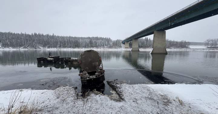 Tanker loses control on icy highway, crashes into North Saskatchewan River