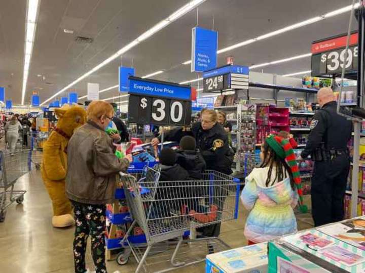 Medina FOP selling raffle tickets for Shop with a Cop