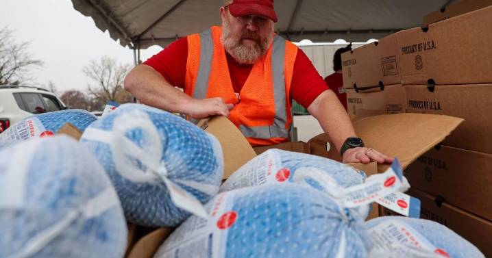 Photos: Turkey giveaway fills hungry families' plates in St. Louis