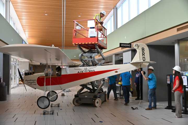 EAA hangs homebuilt plane in Brainerd airport