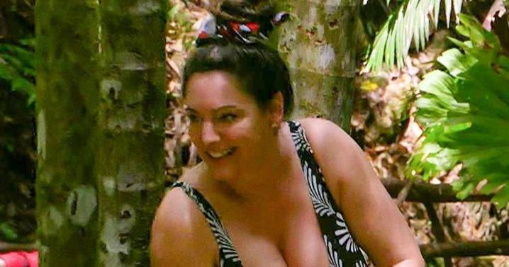 Kelly Brook spills over low-cut swimsuit as she finally strips on I'm A Celeb