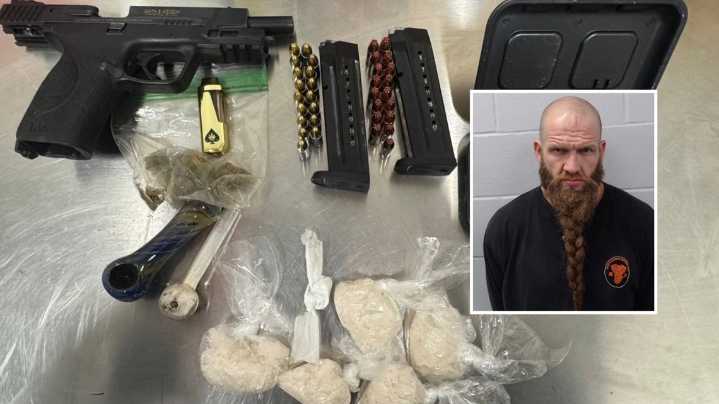 Lockhart man charged after allegedly being found with drugs, stolen gun on I