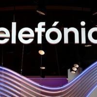 Spain's Telefonica shares drop on dividend cut, net loss