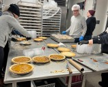 Rescue Mission volunteers, staff in Syracuse serve record number of Thanksgiving dinners