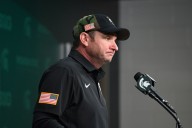 Michigan State fires football coach Jonathan Smith