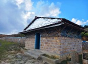 Community efforts convert plastic trash to tourist shed