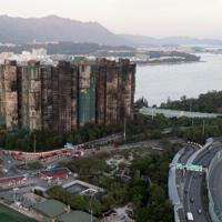 Authorities probe corruption and negligence in Hong Kong's deadliest fire in decades