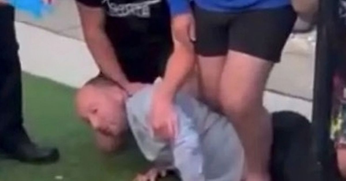 Moment speeding driver is pinned down after ploughing BMW into garden