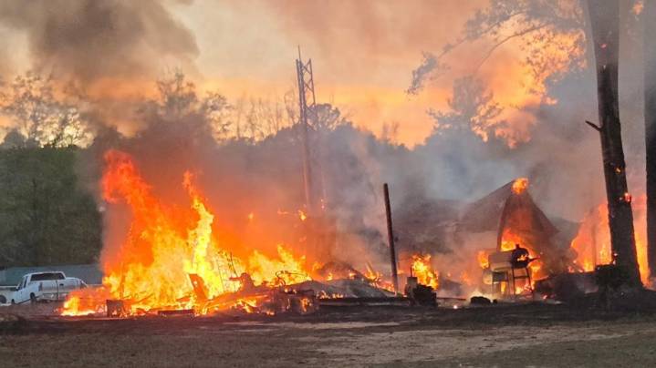 Firefighters putting out shed fire in Washington County