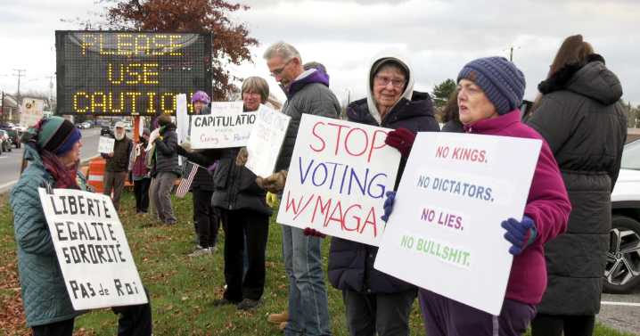 Protestors gather in opposition of Senator King's vote to reopen the government