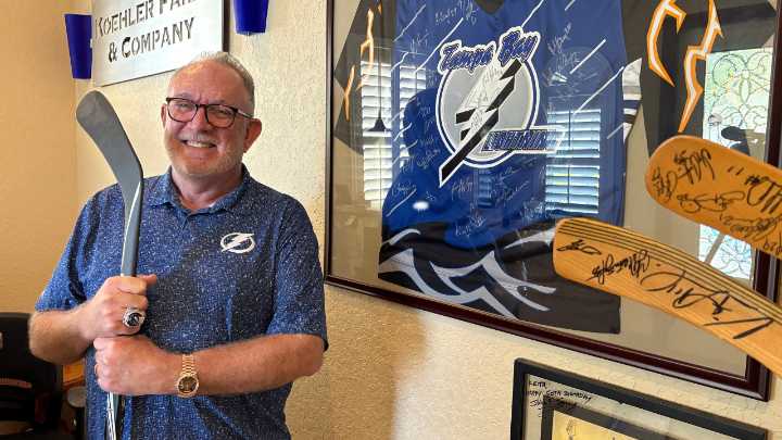Lightning fan fills office with photos, autographs, memorabilia and memories