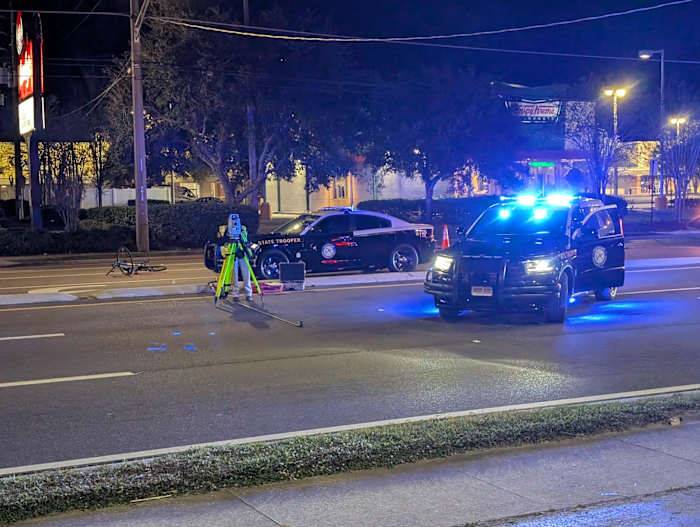Bicyclist dies after being struck by minivan while trying to cross 103rd Street, FHP says