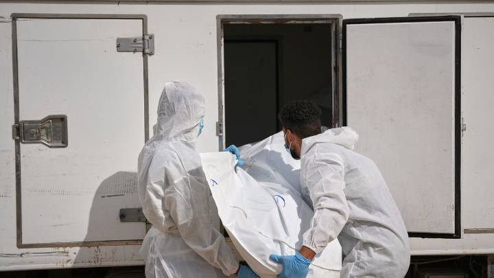 Israel returns 15 Palestinian bodies to Gaza, where displaced families endure winter rains