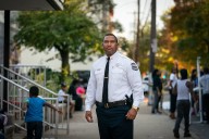 Former police captain Nashid Akil and eight officers charged