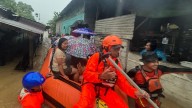 Landslides and flash floods on Indonesia's Sumatra island leave at least 23 dead and dozens missing