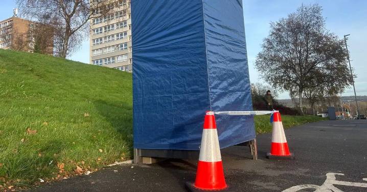 Man found dead in flat and phone box taped off as murder investigation launched