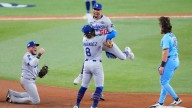 Dodgers survive wild finish to force Game 7 of World Series