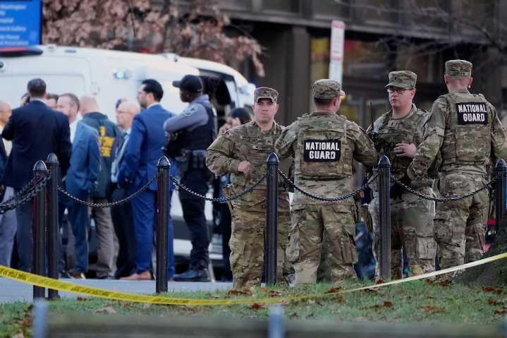 Suspect in shooting of National Guard members faces first