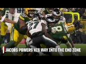 Josh Jacobs battles his way into the end zone for a Packers TD