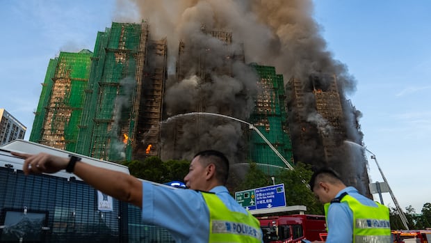 Hong Kong fire in highrise housing complex leaves 13 dead
