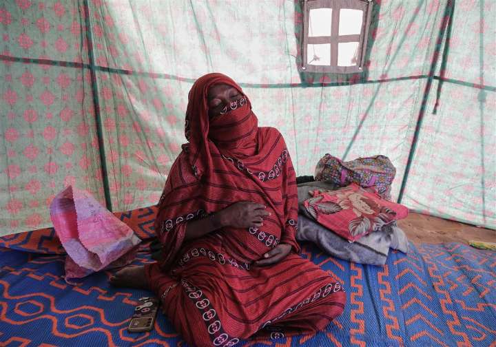 Dozens of pregnant women flee from Sudan's el-Fasher, risking their lives and babies