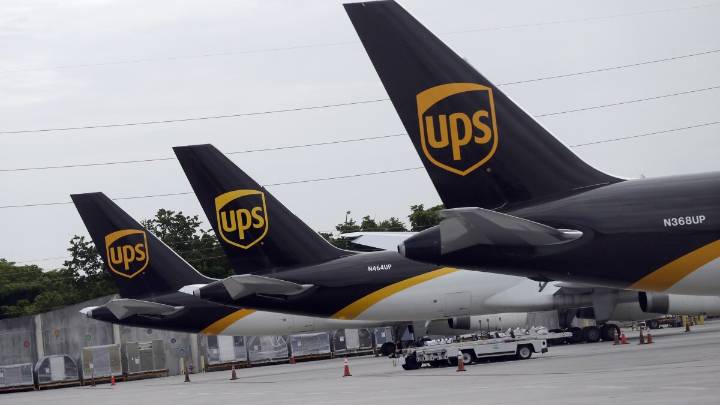 Some UPS and FedEx planes are grounded. What does that mean for holiday shipping?