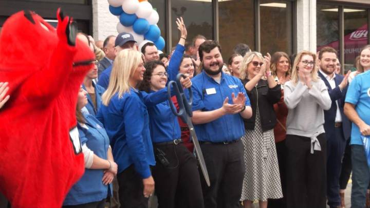 Ribbon-cutting celebrates Price Less IGA reopening, Houchens presents donations