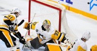Predators win in OT over Penguins, snap five