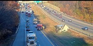 Drivers reported injured after semi crashes in median on I