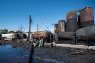 Crews still cleaning up oil dumped into south Louisville waters by UPS plane crash