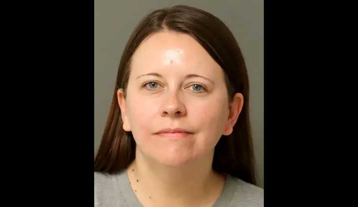 Aide to Republican state senator arrested for burning a house with 2 people inside: report