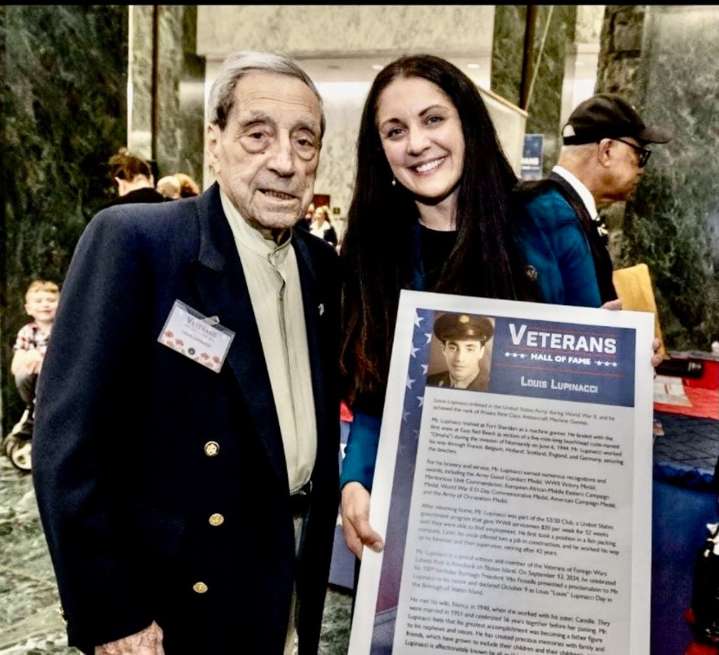 ‘Uncle Louie,’ a 101-year-old D-Day veteran, has a flag on Forest Avenue and his name in the Veterans Hall of Fame