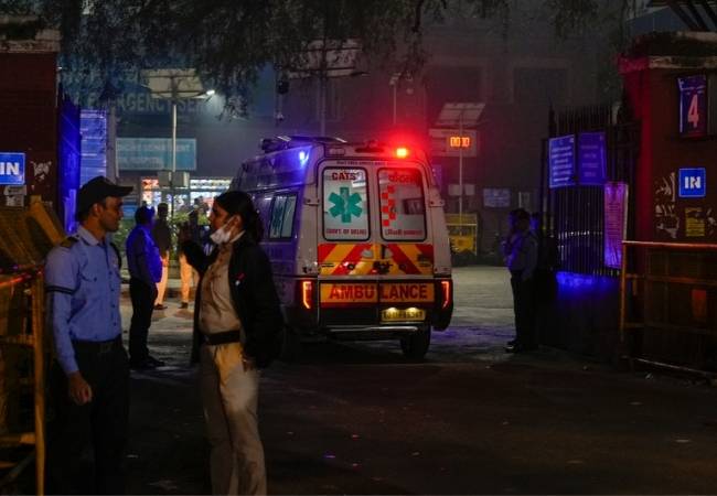 Distraught families wait in anguish outside LNJP Hospital after R...