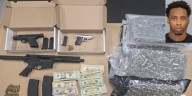 Manchester man arrested for guns, drugs, and a stolen vehicle