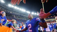 State college football wrapup: Gators beat FSU, hire coach, Miami wins