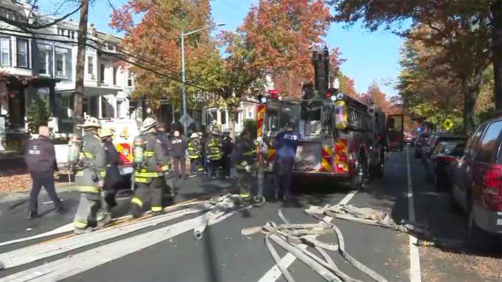 Child and teen rescued from 14th Street NW rowhouse fire