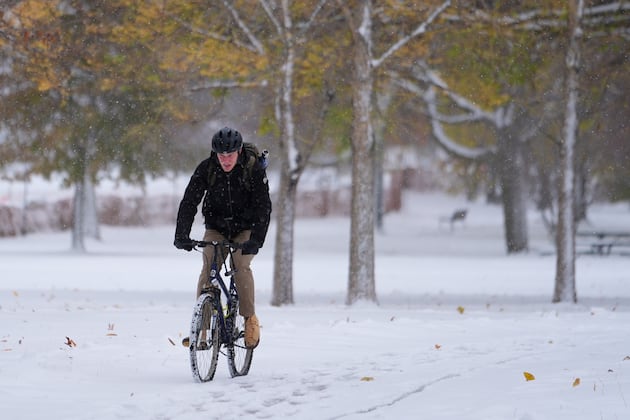 Early-season arctic blast blankets Midwest and East with snow and record cold