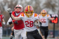 7A football: Henry Hahn steps up to challenge for Batavia