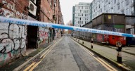 Police enforce new powers in Manchester city centre after man left fighting for life with woman arrested