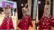 Indian Badminton player Sania Nehwal dazzles in red floral gown at Miss Universe 2025