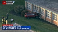 Burbank news: Car crash damages St. Laurence High School at 5556 West 77th Street in Burbank, Illinois