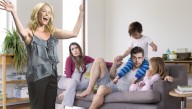 Chelsea Handler Bursts Into Family's Living Room To Tell Them She's Totally Happy Being Child