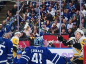 Maple Leafs score four in third period to shock Penguins for win