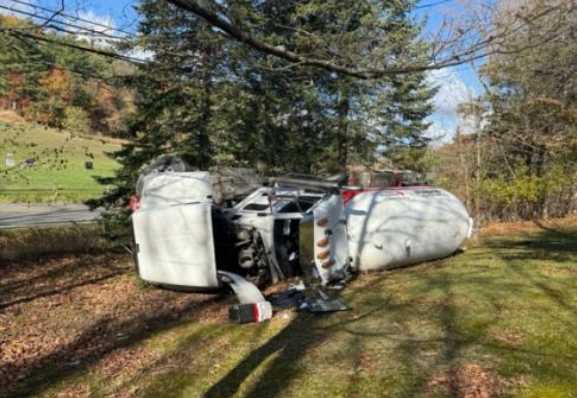 Propane truck rolls over into yard in New Scotland