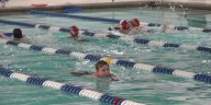 Local team swims around the clock for 24-hour relay fundraiser