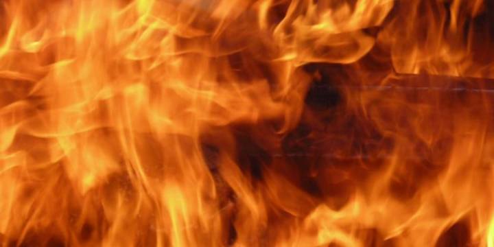 Person pulled from burning vehicle in Norwalk