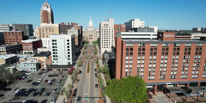 Gov. Whitmer announces new project to add housing and commercial redevelopment in Downtown Lansing