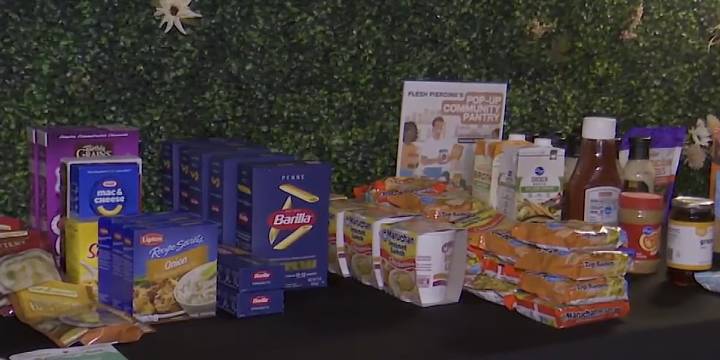 Local piercing shop provides free food and household items to community members in need